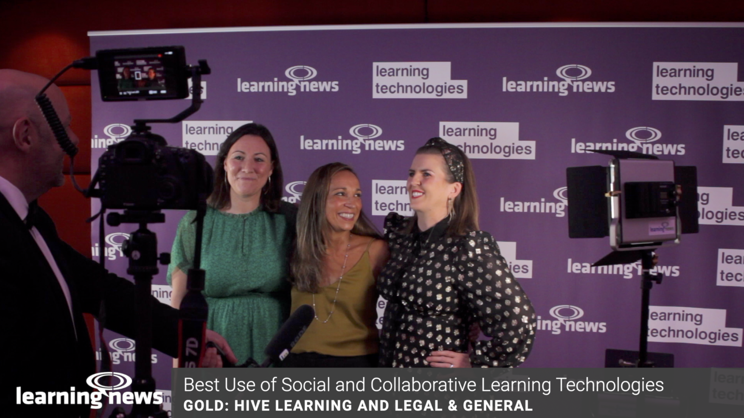 Gemma Paterson (right) from Legal & General and the winning team talk to Learning News after receiving their Gold Award